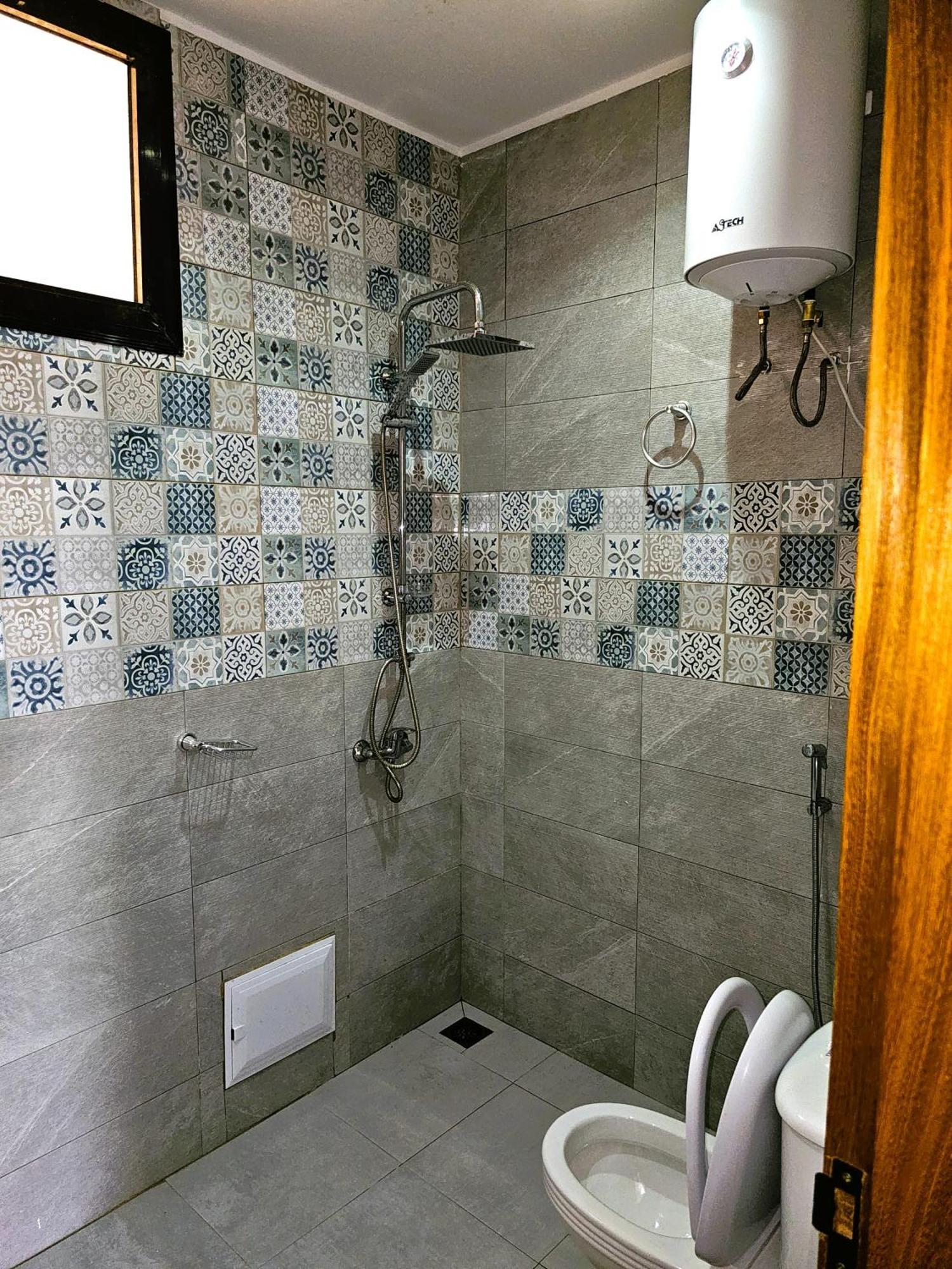 Chambre Ngor- Douche Privee-salon-cuisine-netflix Pensión Dakar